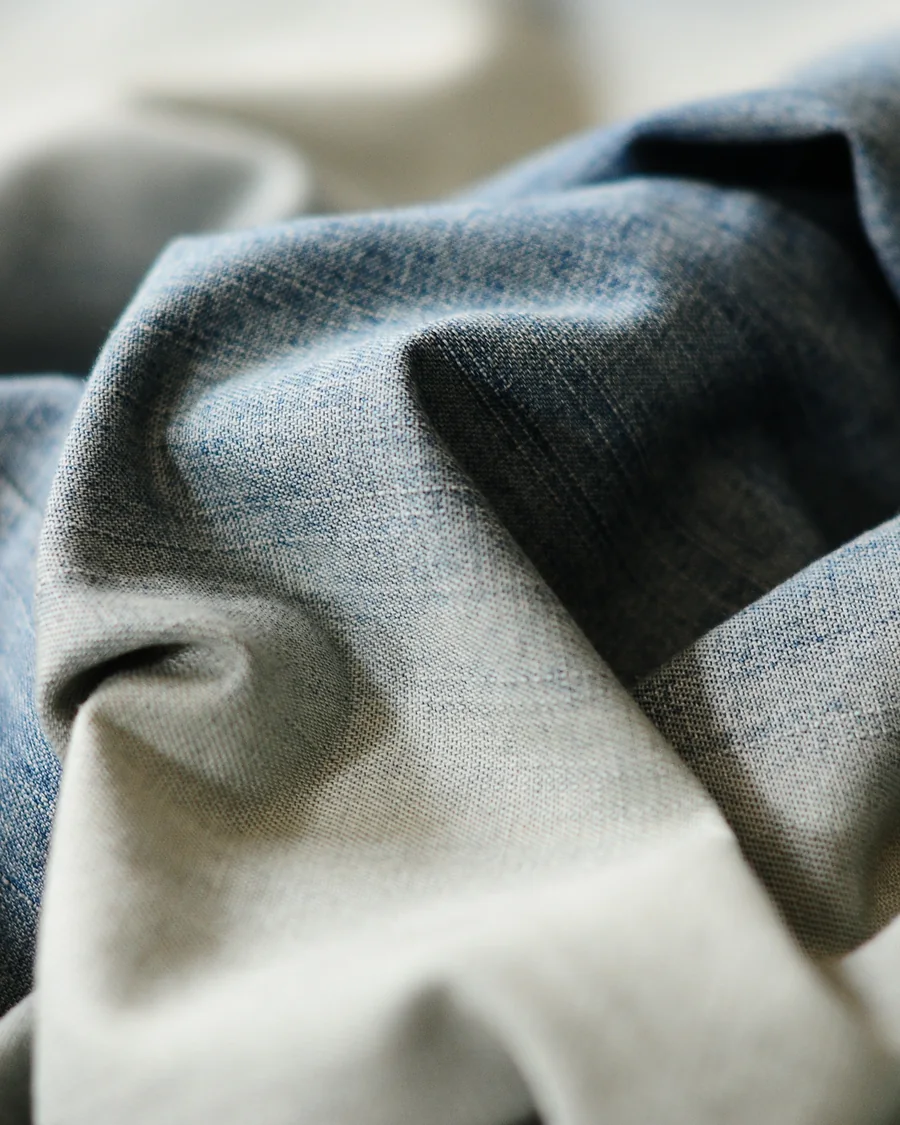 Close-up of soft washed denim folds