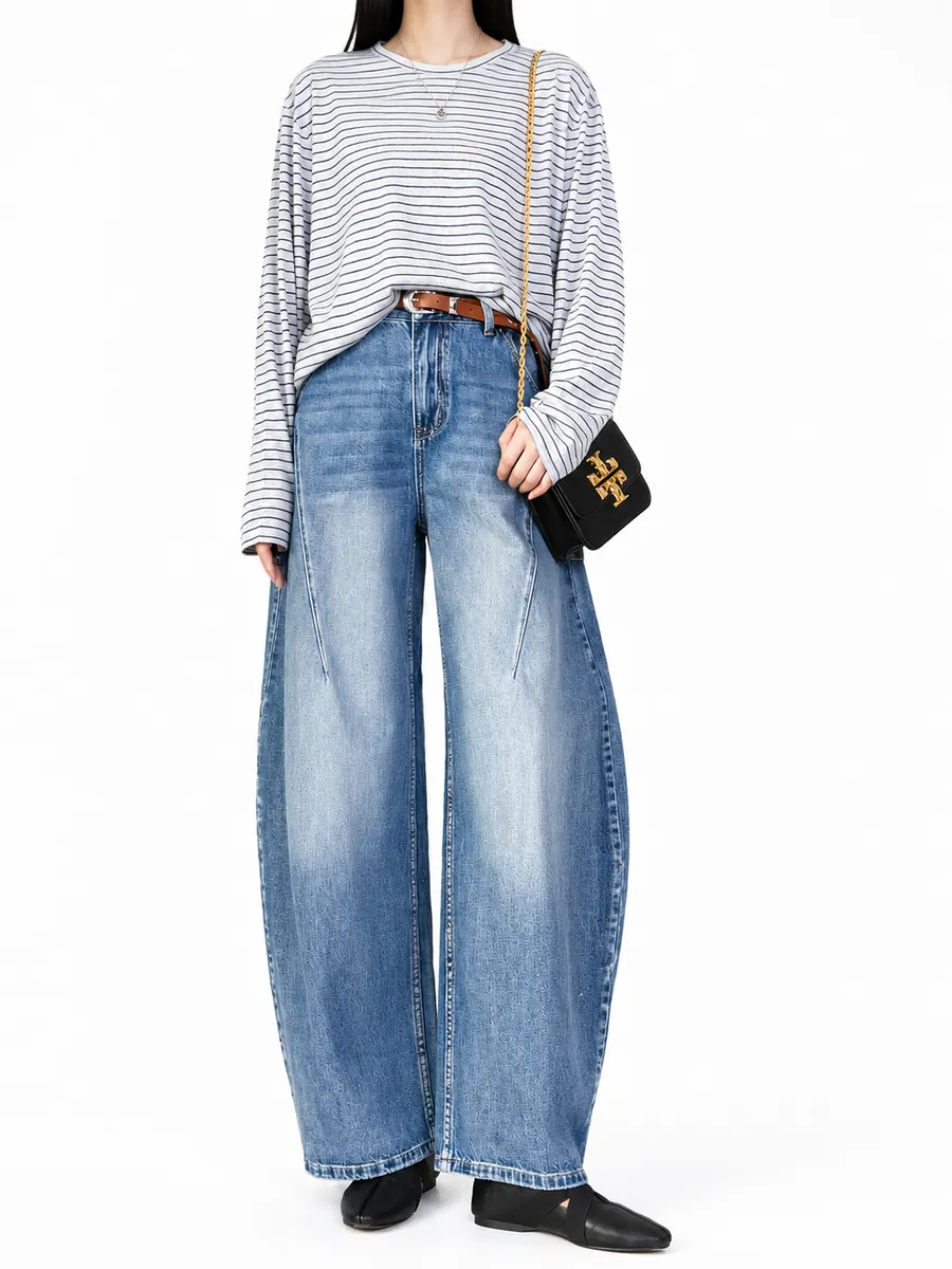 Barrel-leg jeans in a light blue wash, striped knit