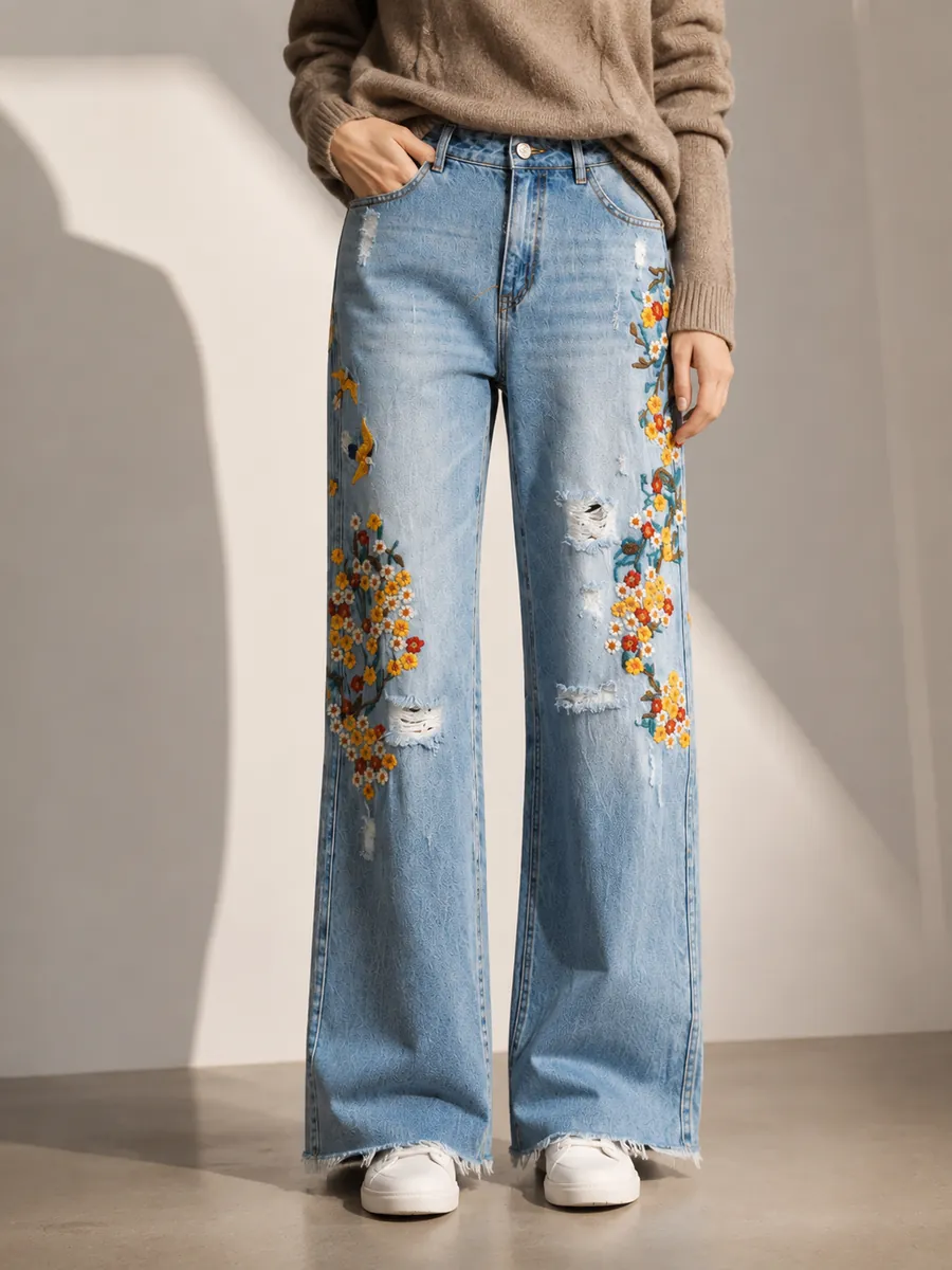 Straight jeans with floral embroidery and light distressing