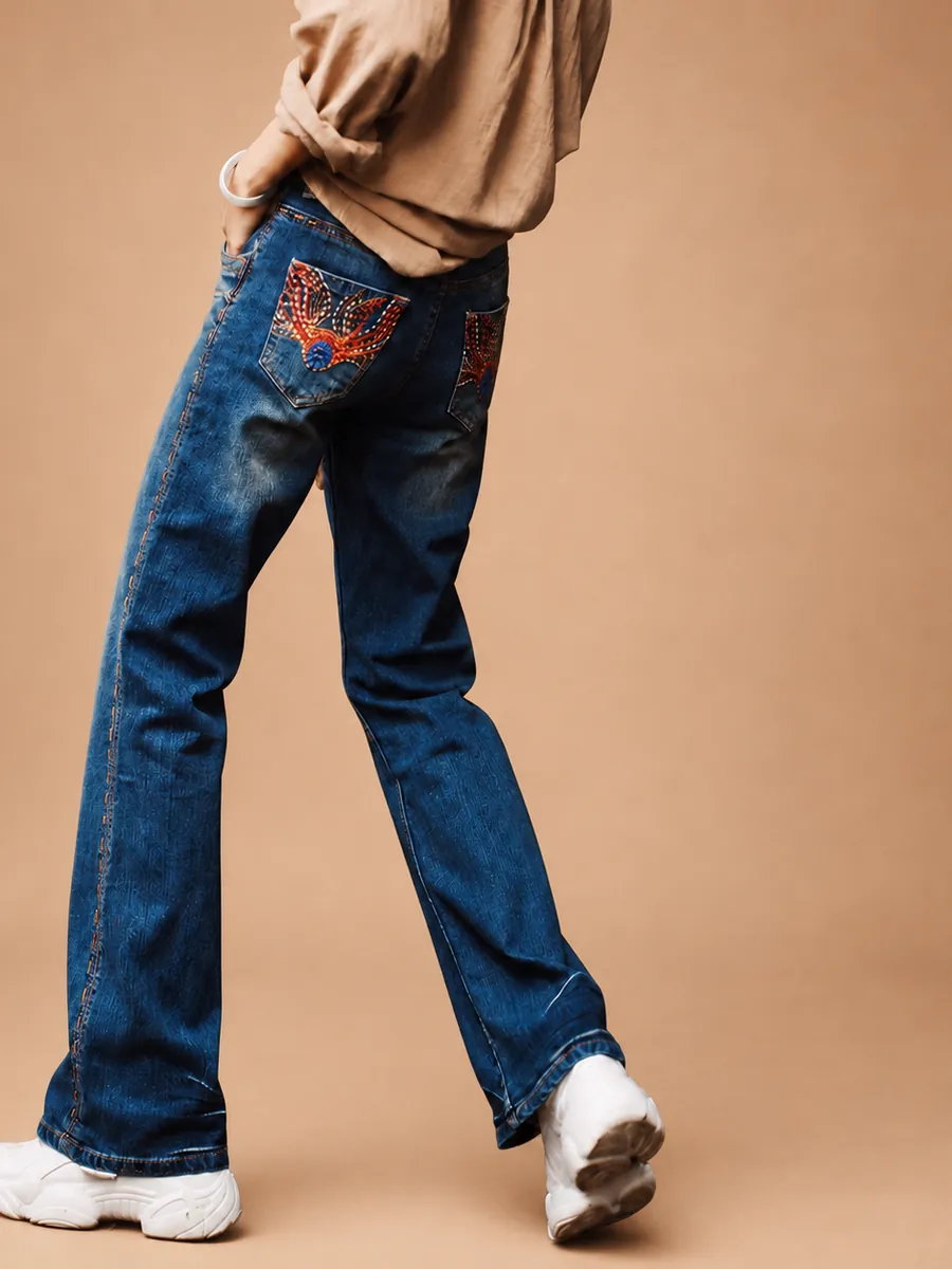 Dark flared jeans with red embroidery